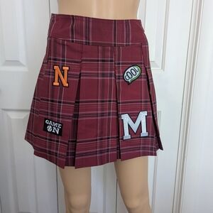 No Boundaries  Size XS 1 Red Pleated Tennis Skirt With Patches .